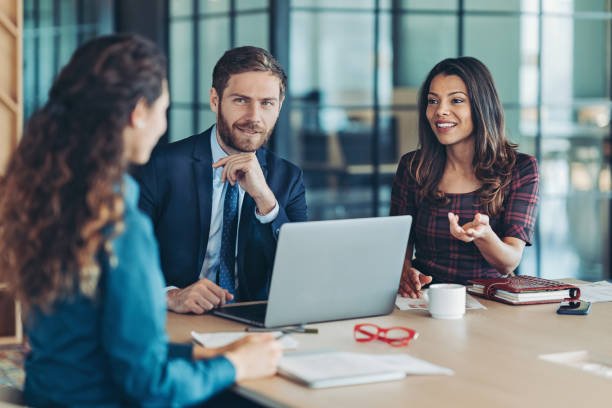 group of business persons during a meeting in the office